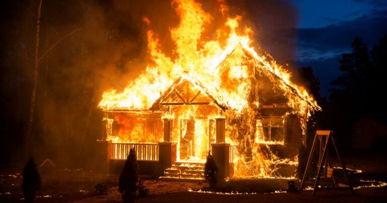 Burning house in the forest